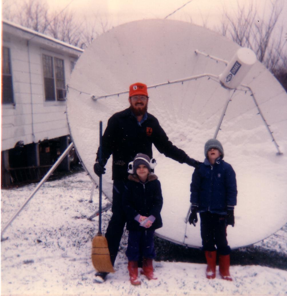 Dad, me and Christopher in front of the dish on a rare MS snow day